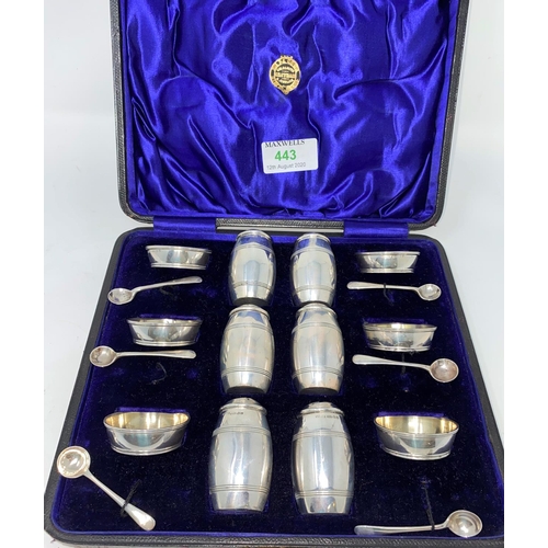 443 - A cased 12 piece barrel shaped cruet set comprising six salts, six pepper pots and six salt spoons i... 