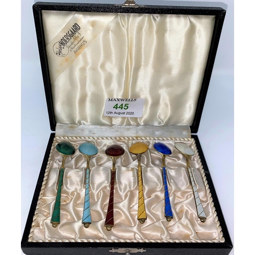 445 - A cased set of six Danish gilded and individually coloured enamel coffee spoons stamped Denmark Stir... 