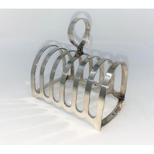 449 - An Arched six division hall marked silver toast rack London 1937 4.3oz (133gms) by Charles Boynton