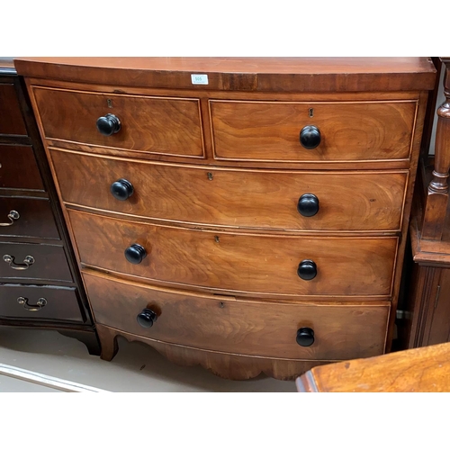 505 - A Victorian mahogany bow front chest of 3 long and 2 short drawers, with shaped apron, on bracket fe... 