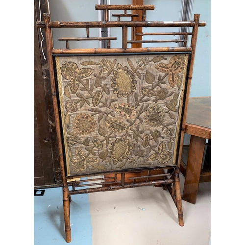 528 - A late 19th/early 20th century bamboo framed screen with silk insert of flowers, height 105 cm