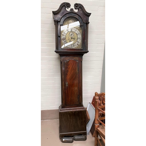 592A - An 18th century Scottish mahogany longcase clock, the hood with swan neck pediment, carved flower he... 