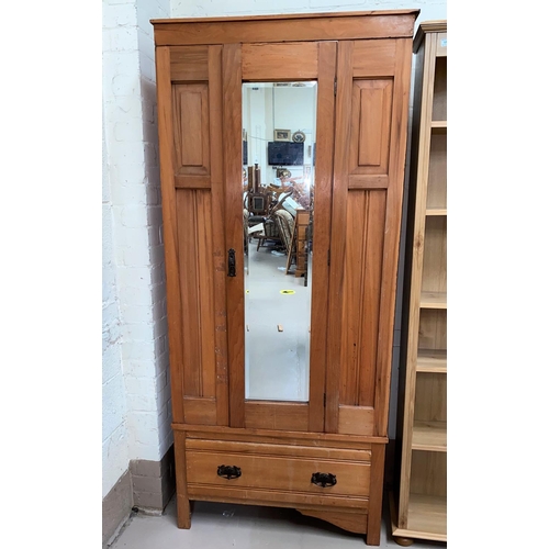 625 - An Edwardian satin walnut single wardrobe with mirror door
width 84cm x depth 30cm x height 193 cm