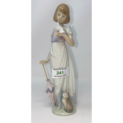 241 - A Lladro Collectors Society figure:  woman with umbrella, boxed
