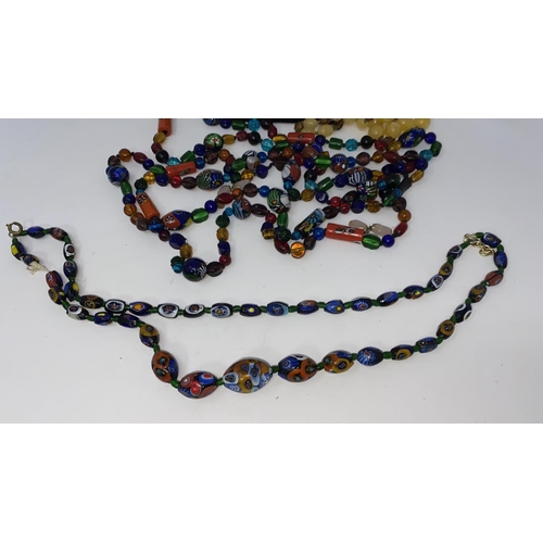 397 - A selection of bead necklaces including foil flecked beads, mille fiori etc
