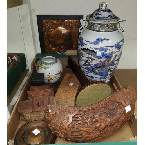 102 - A selection of oriental carved wooden items, ceramic ginger jar etc