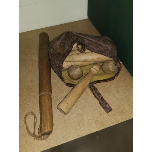 119A - A wooden truncheon; a 19th century wooden skittles game