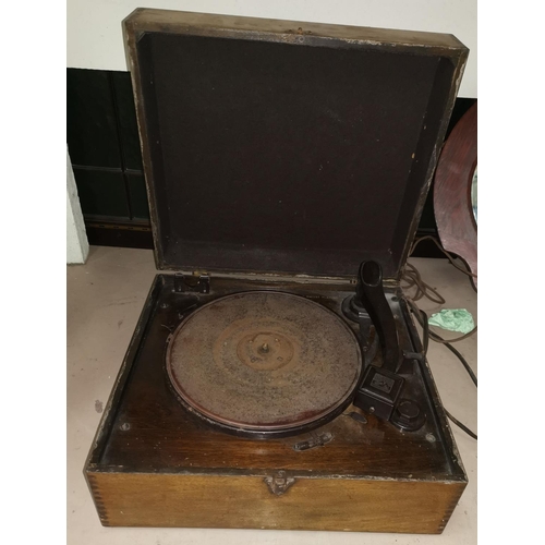 152 - An early electric table top record player by HMV (sold as a collectors item only)