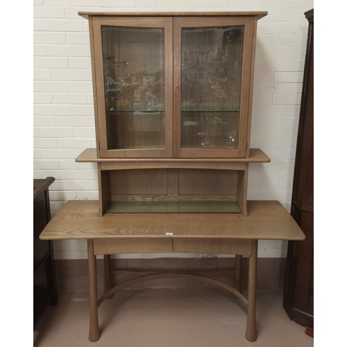 534 - A modern Ercol full height display cabinet, 'Silver Mist', with double glazed cupboards over double ... 