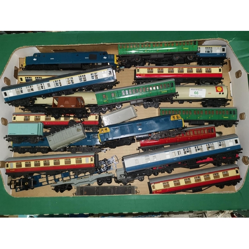 66 - A collection of Hornby 00 gauge trains; garages; etc., some tinplate