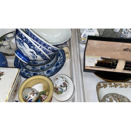 296 - A collection of modern oriental blue & white rice bowls, a Waterford Crystal bottle stand, decanters... 