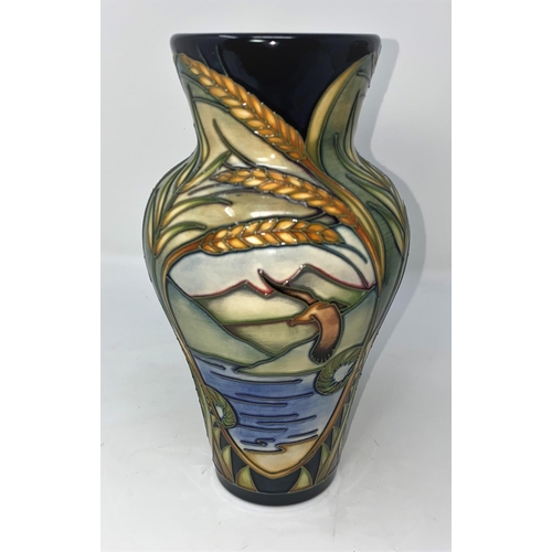 249 - A modern Moorcroft vase of inverted baluster form, decorated with ears of wheat and reserve panels o... 