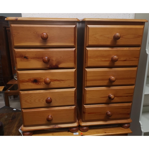 479 - A modern pine pair of 5 height chests of drawers