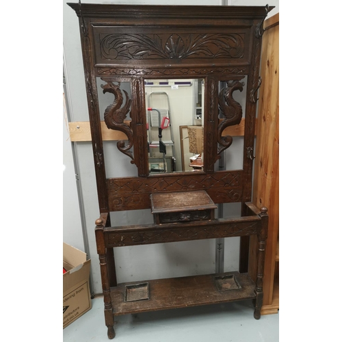 524 - A Victorian carved oak hallstand with mirror back