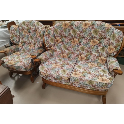 536 - A modern 2 seater settee, Ercol style with stick back, 2 similar armchairs with floral upholstery