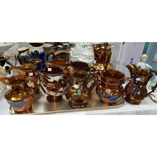 235 - A Victorian collection of 10 large copper lustre jugs