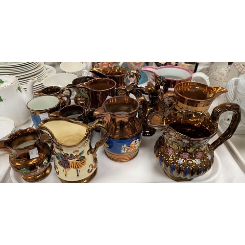 236 - A Victorian collection of 13 large copper lustre jugs