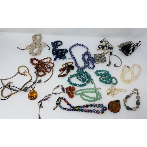 416 - A selection of necklaces, millefiore beads etc