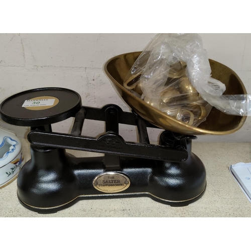 30 - A vintage shop scale with brass graduating weights