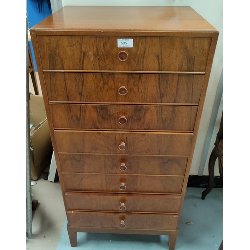 595 - A 1930's walnut music cabinet with 8 drawers