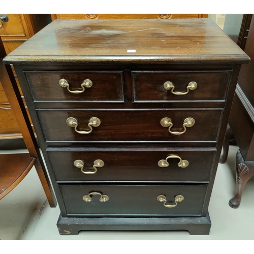 609 - A mahogany dwarf chest in the Georgian style with 3 long and 2 short drawers