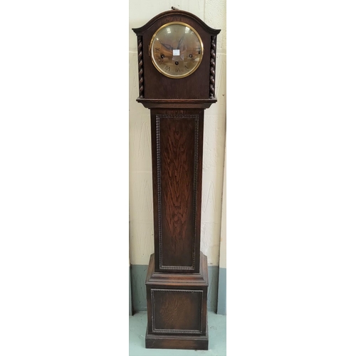 611 - A 1930's oak grandmother clock with chime
