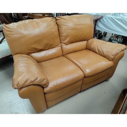 620 - A tan coloured two seater settee with one reclining side