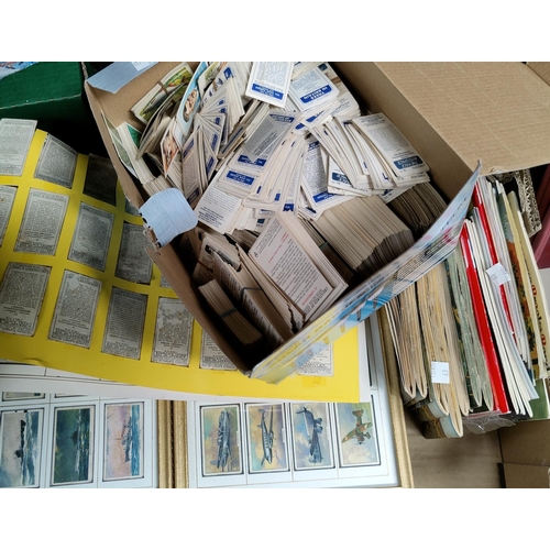 335a - A large collection of cigarette and tea cards, in frames, albums and loose