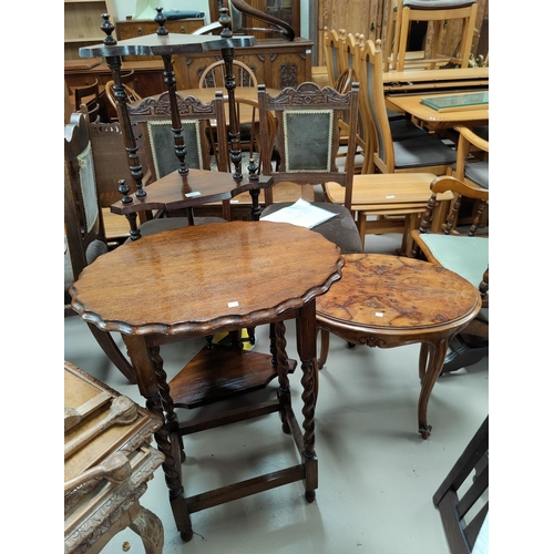 537 - A reproduction corner whatnot; an oak occasional table with oval scalloped top, on barley twist legs... 