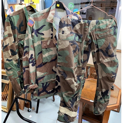 60 - Two military camouflage jackets, one with USA flag patch to arm and a pair of chemical suit military... 