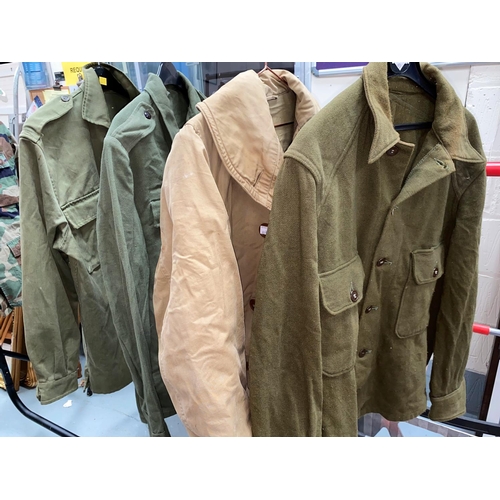 60A - A WWI soldiers jacket; an Eastern European military jacket; a double layer beige cold weather milita... 
