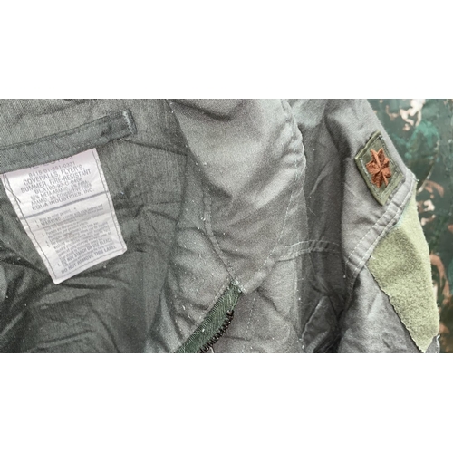 60G - Two American military coveralls, patches removed, one with seven double bar to shoulder (one arm cut... 