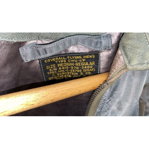 60J - A Vietnam War period 1958 American flying jump suit date and details on the label by Berstein & Co w... 