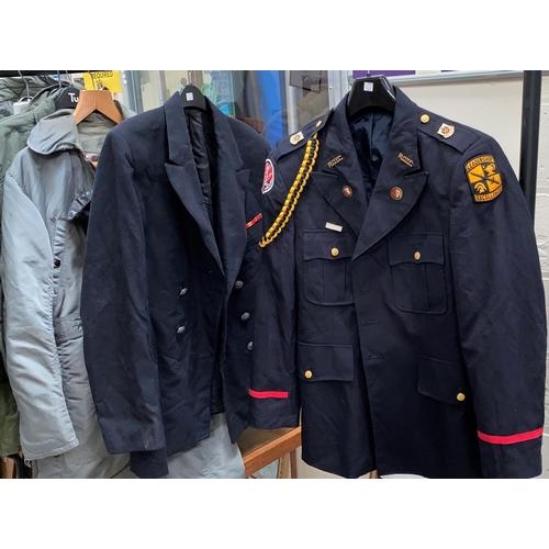 60K - A military ROTC dress uniform with badges and a Naval jacket
Medium