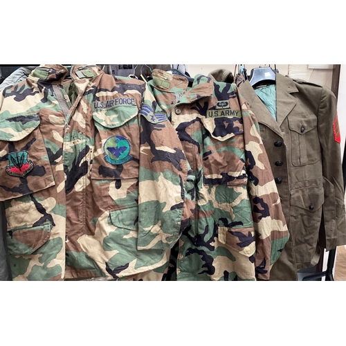 60Q - Two US Army camouflage jackets with military patches and another dress Army jacket
33-37 T36/36-40