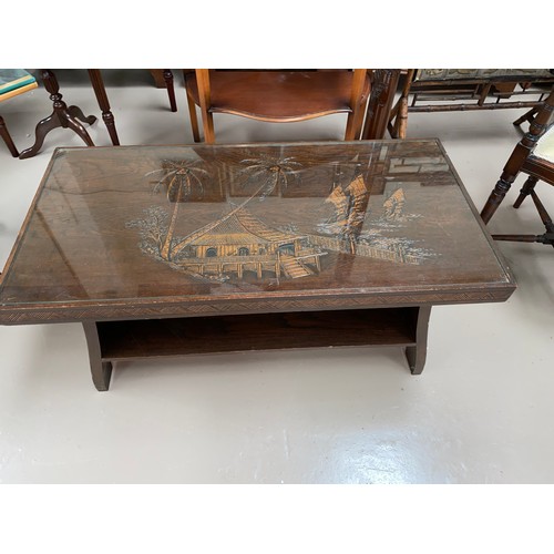 612A - A mid 20th century camphorwood coffee table and standard lamp