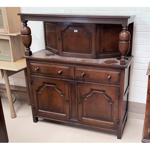 551C - A reproduction oak court cupboard with single cupboard over 2 drawers and 2 cupboards