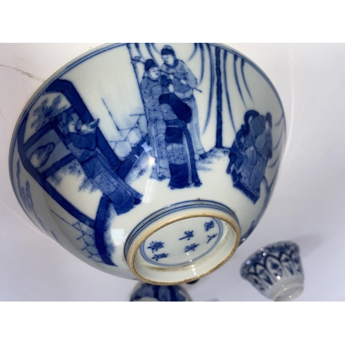 123 - A Chinese shallow blue and white vase depicting traditional scenes, 6 character mark to base; a mini... 