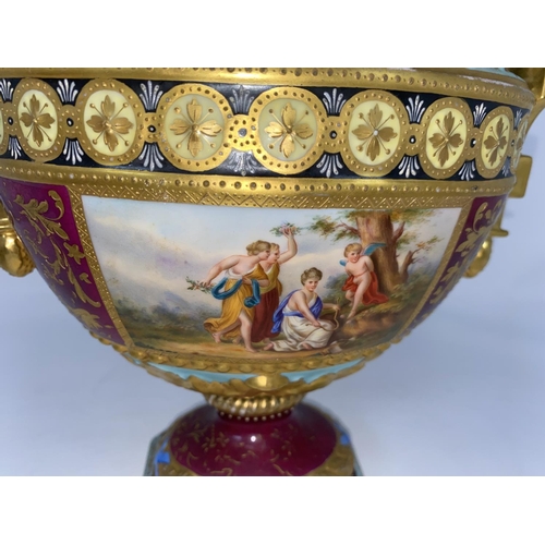 180 - A Vienna porcelain covered oval vase in the classical style, on pedestal with 2 handles, reserve pol... 