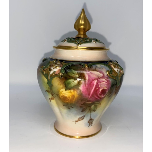 184 - A Royal Worcester squat circular vase with pierced slender neck, hand painted with roses, H36, unsig... 