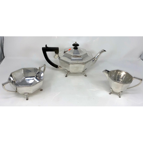 263 - An Art Deco octagonal silver plated 3 piece tea set on raised feet with entwined Celtic border