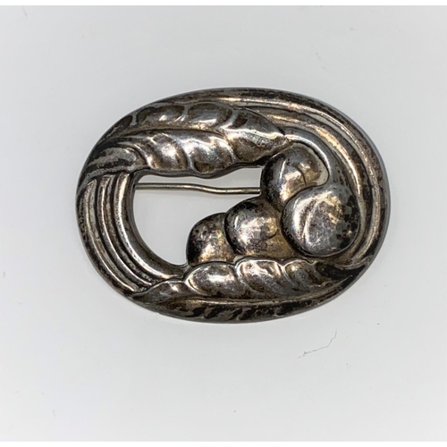 288 - A Georg Jensen Danish silver oval brooch of stylized leaf and brooch design, stamped Georg Jensen in... 