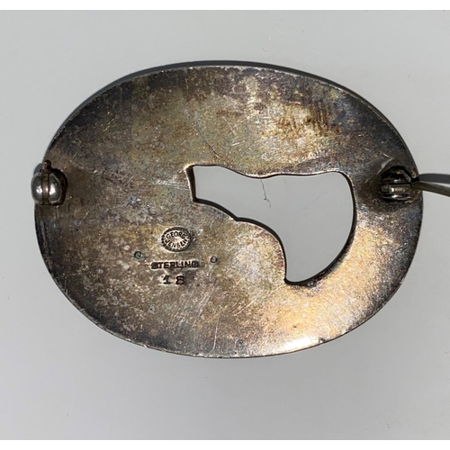 288 - A Georg Jensen Danish silver oval brooch of stylized leaf and brooch design, stamped Georg Jensen in... 