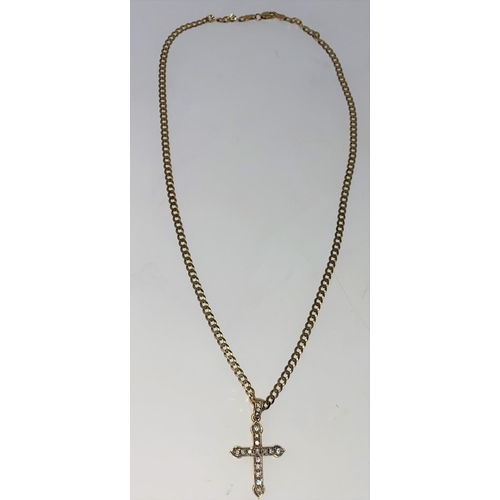 298 - A 9 carat hallmarked gold gem set cross and chain, 6.9 gm gross