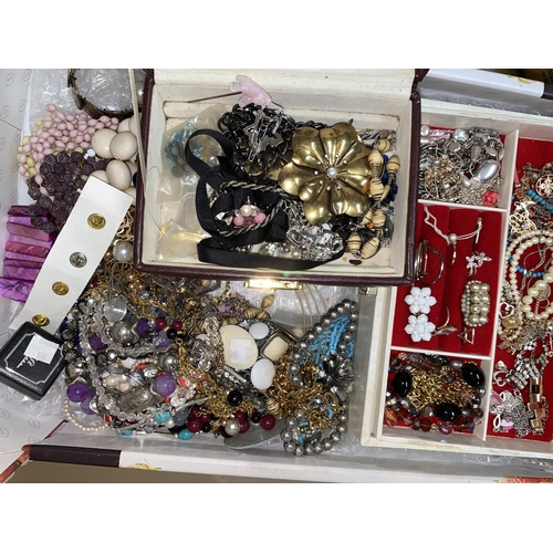 300 - Two jewellery boxes and a large selection of costume jewellery