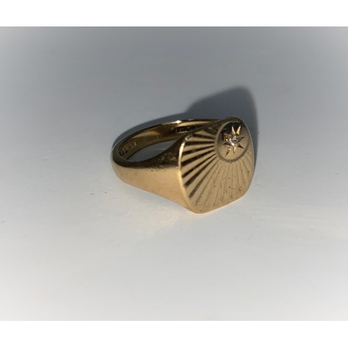 313b - A gent's 9 carat hallmarked gold signet ring set small diamond
