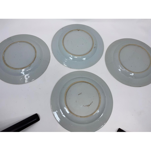 54 - A set of 4 Chinese plates decorated with central panels decorated with deer, diameter 23cm
