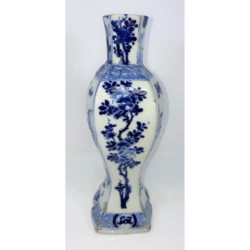 55 - A 19th century Chinese blue and white vase, decorated with vases, etc, height 28cm (vase cut down an... 