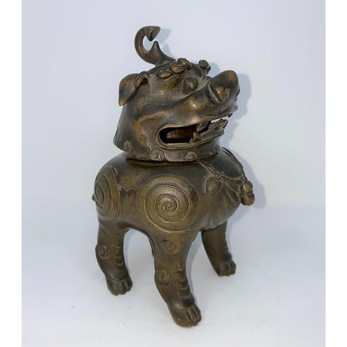 56 - An 18th century Chinese bronze incense burner in the form of a mythical beast, height 15cm