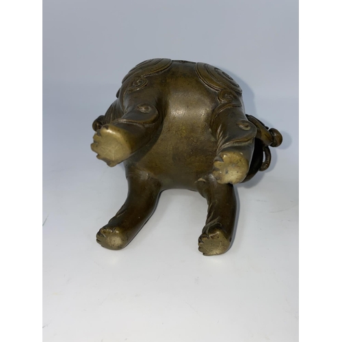 56 - An 18th century Chinese bronze incense burner in the form of a mythical beast, height 15cm